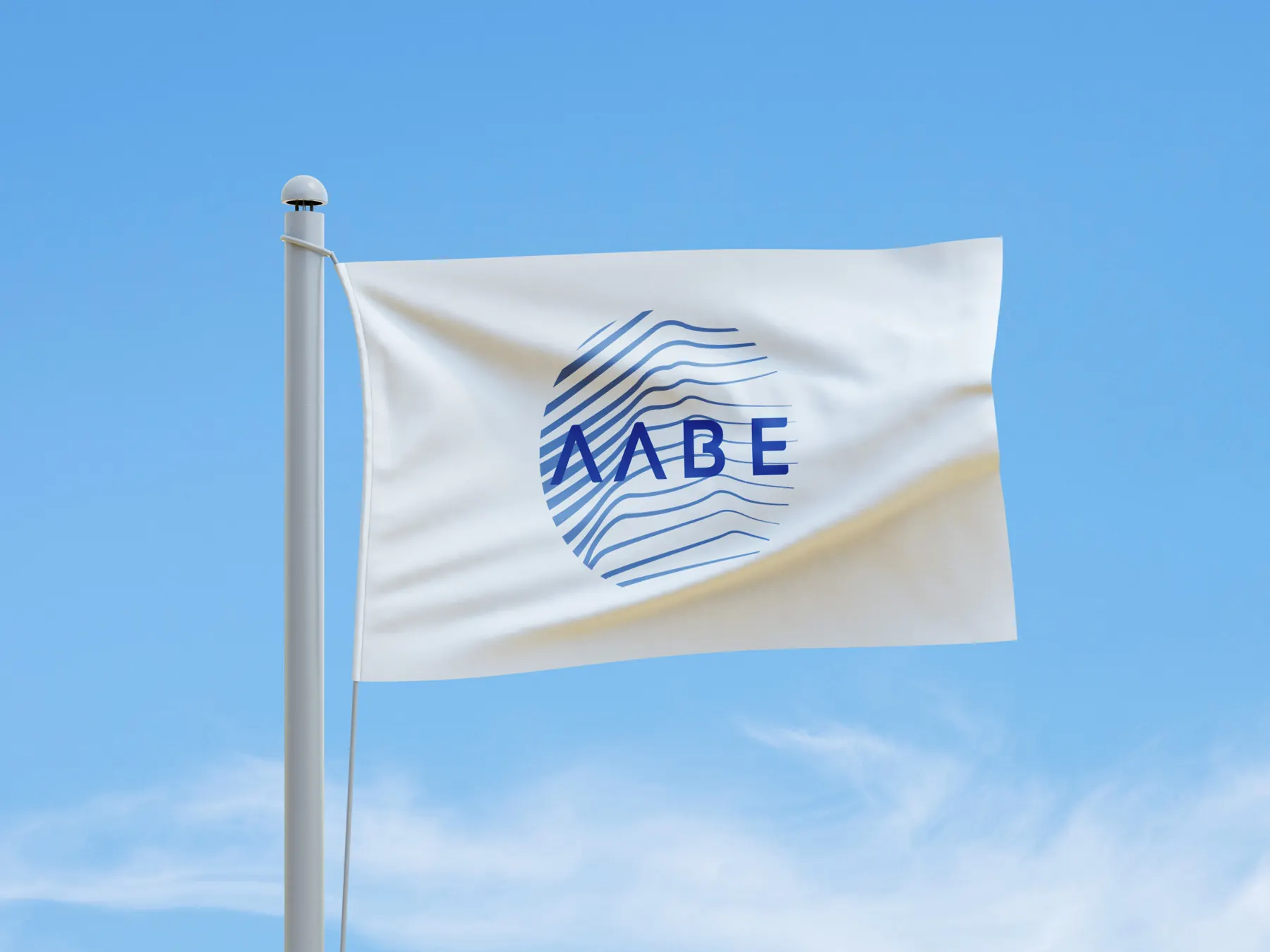 A white flag carrying the blue AABE logomark, flying against a clear blue sky.