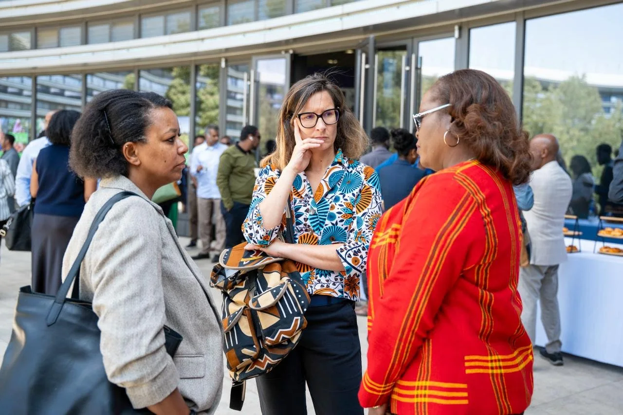 ESG Forum 2026: three participants in conversation outside the venue.